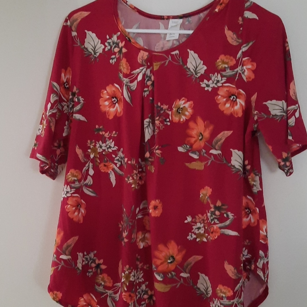 Red floral blouse.